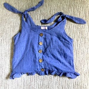 Never worn, blue top